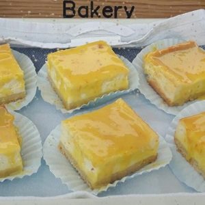 baked cheesecake with orange curd topping